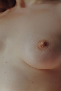 Riccarda Exposing Beautiful Breasts And Natural Bush