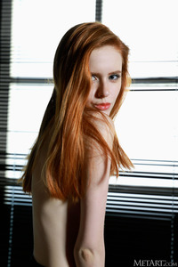 Leggy Blue-eyed Babe Bella Milano Shows Shaved Pussy Invitingly