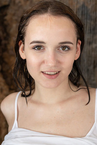 Rokki Her Firm Round Butt Cheeks Glistening Enticingly