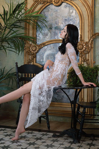 Bembi Teases With A Smile In Lace As She Bends Over Invitingly