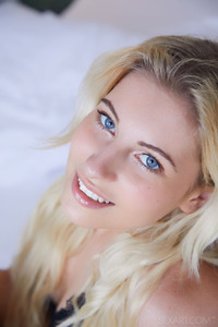 Lilly Bella Caressing Her Lovely Breasts And Tugging Her Panties Aside