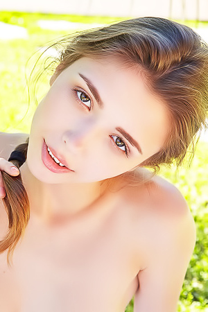 Sweet faced Mila Azul look super sexy sitting naked on a blanket