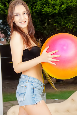 Elena Parkov removes her little black top and jeans shorts, exposing her boobs