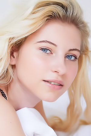 Lilly Bella Caressing Her Lovely Breasts And Tugging Her Panties Aside