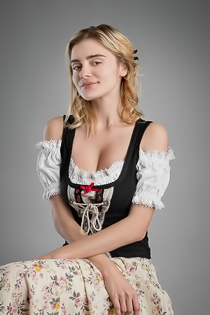 Marria Leeah undresses, exposing her slim frame and picture-perfect breasts