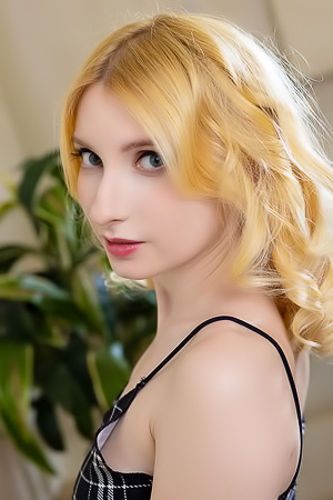 Minnie Lighter Squeezing Her Gorgeous Breasts And Smiles Seductively