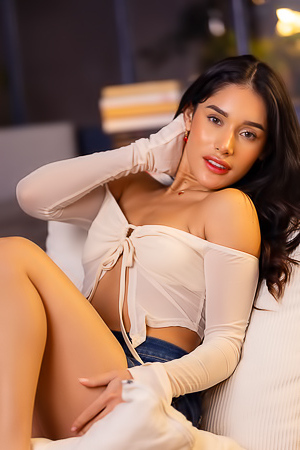 Carolina Guerrero Seduces In Her Bedroom Wearing Denim Shorts And A White Top Whispering Temptation
