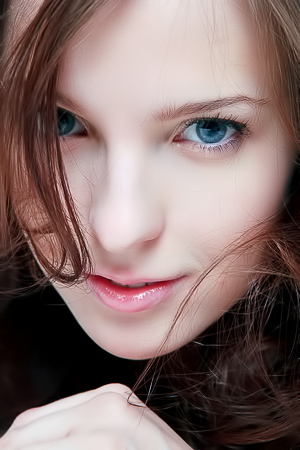 In Bed, Ilze Strikes a Pose, Knowing Your Gaze Is On Her