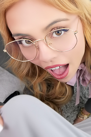 Angel Winey Teases with Blowjob and Cowgirl Action on the Desk